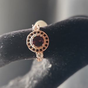 G-5 Rosegold tone ring with red and clear stones
